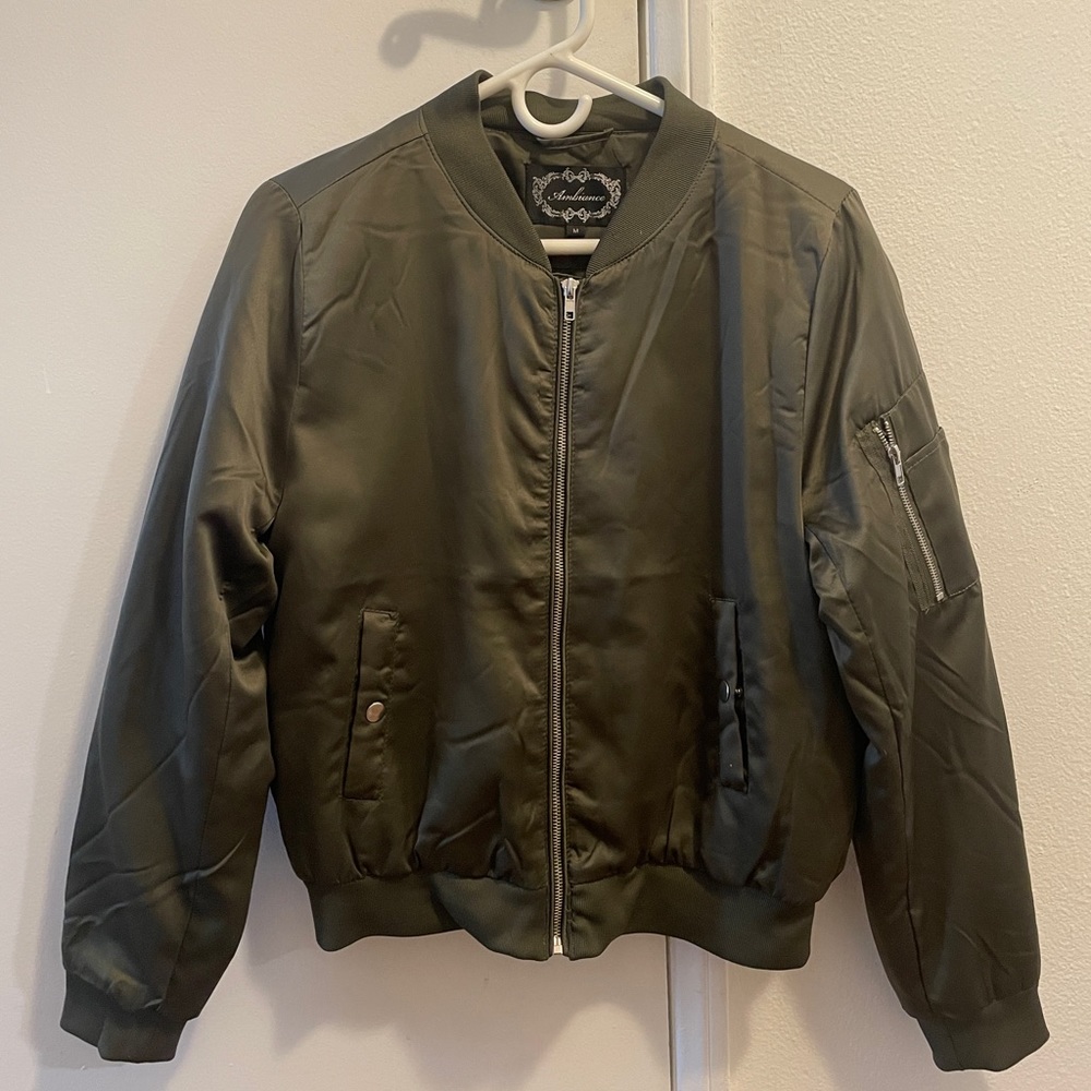 Green bomber style jacket